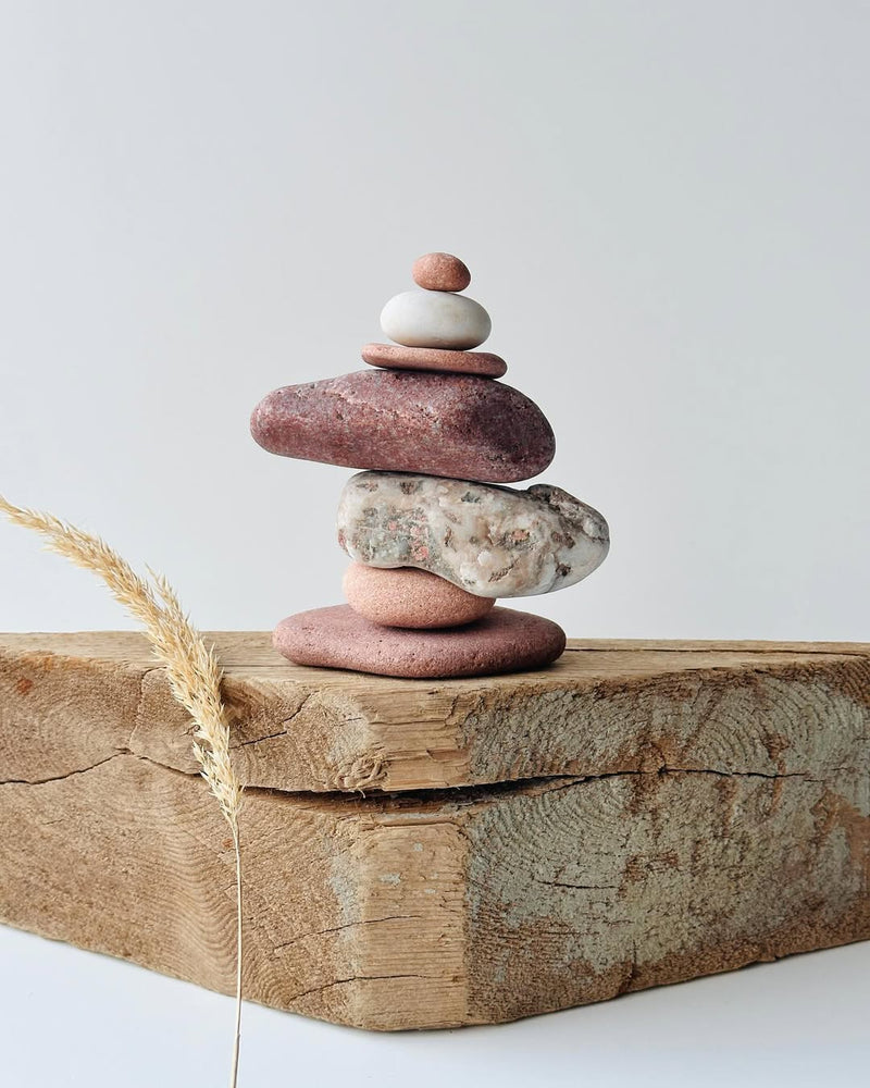 Worry stone on a minimalist workspace